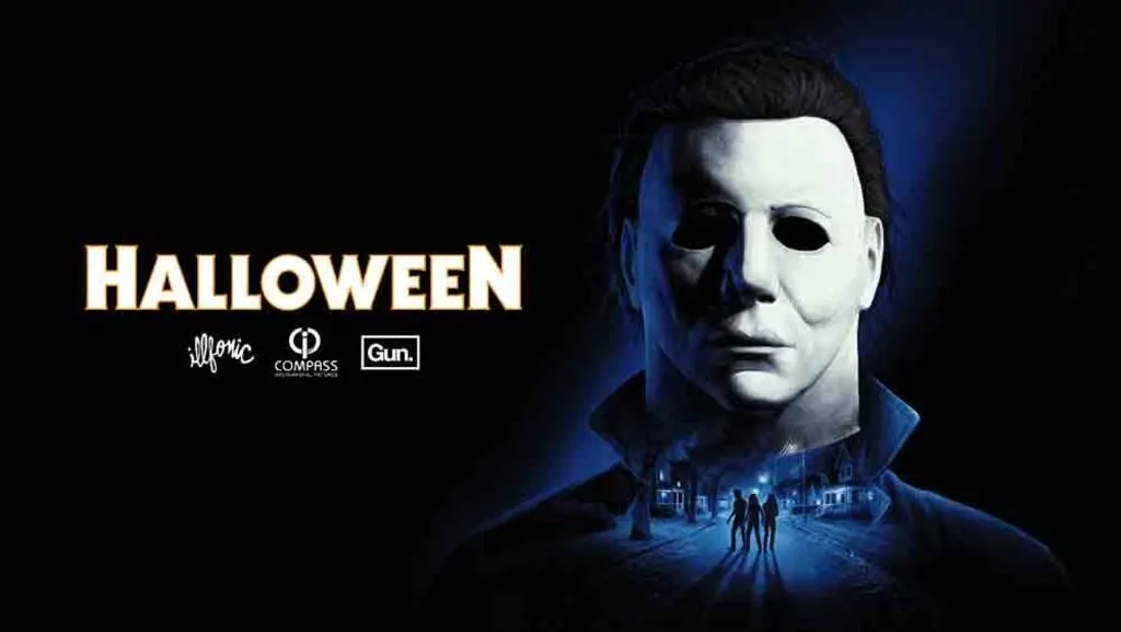 Arte promocional de Halloween: The Game mostra Michael Myers usando sua máscara branca, com silhuetas de personagens em uma rua escura de Haddonfield.